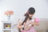 45569554-Asian-woman-holding-her-sleeping-baby-girl-Stock-Photo-baby.jpg