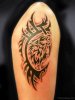 Tribal-Wolf-Tattoo-On-Shoulder.jpg