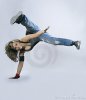 teenage-girl-dancing-breakdance-17559117.jpg