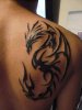 Black-Tribal-Dragon-Tattoo-On-Man-Right-Back-Shoulder.jpg