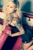 sara_fabel_ornamental_wings_sleeve_chest_neck_tattoos-660.jpg