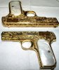 dual set of gold guns.jpg