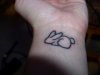 rabbit wrist tattoo.jpg