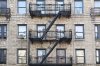 stock-photo-black-fire-escape-in-brooklyn-new-york-234914824.jpg