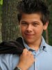 6941-a-young-latino-teen-boy-posing-outdoors-by-a-tree-pv.jpg